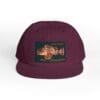 Maroon snapback hat with a vintage motorcycle patch on the front.