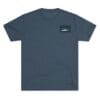 Dark blue t-shirt with a small chest logo patch.