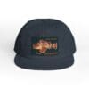 Black snapback hat with a vintage motorcycle patch.