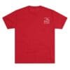 Red T-shirt with a small white logo on the upper left chest.