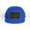 Blue cap with a black patch featuring a fish design.