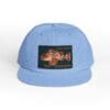 Light blue cap with a vintage motorcycle patch on the front.