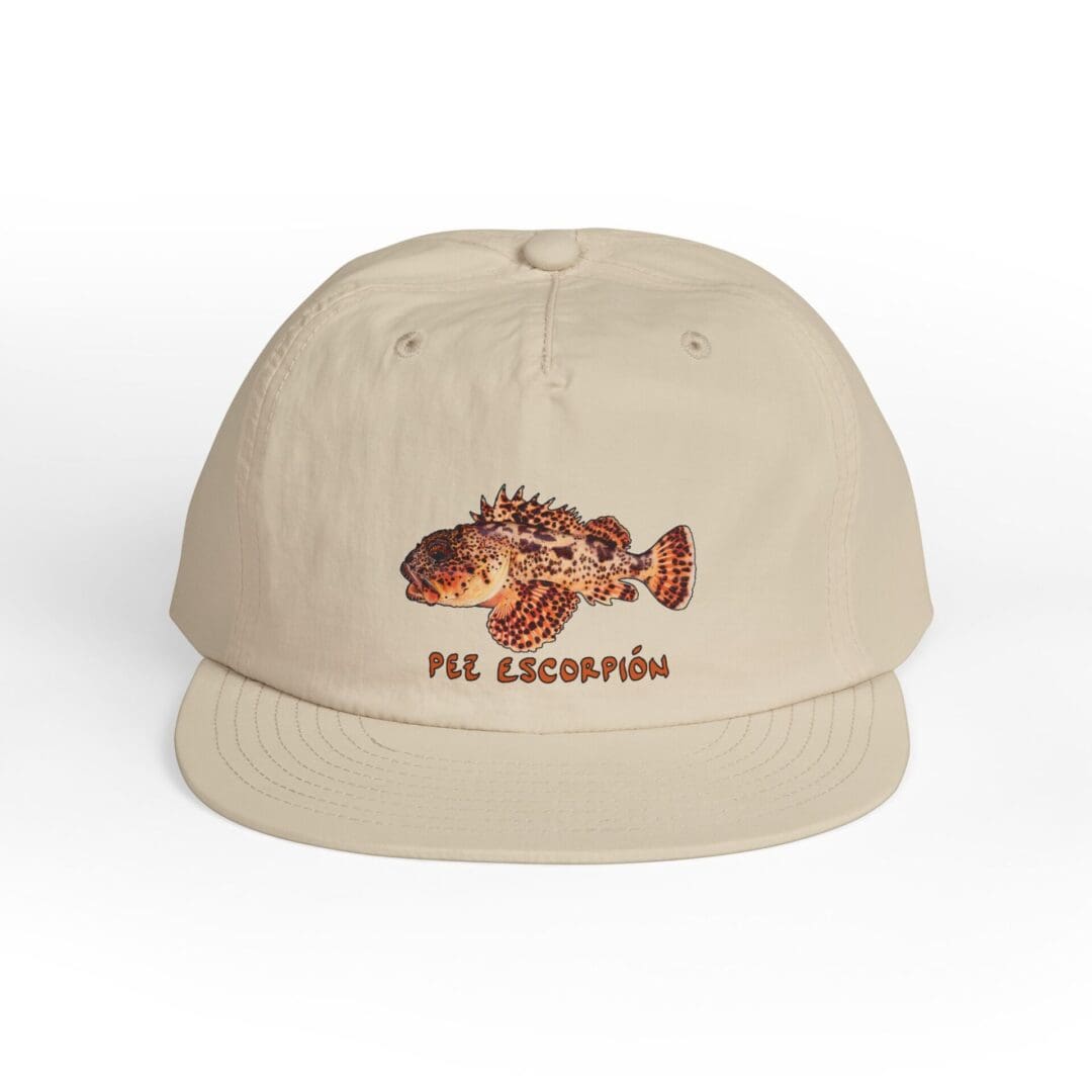 Beige cap with a detailed fish embroidery on the front.
