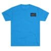 Bright blue T-shirt with a small black label on the chest.
