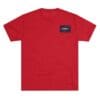Red t-shirt with a small rectangular patch on the chest.