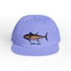 Light purple baseball cap with a shark design and 'OCEAN AIR' text.