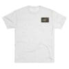 White t-shirt with a small rectangular logo on the upper left chest.