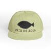 Beige cap with a black duck silhouette and 'PATO DE AGUA' text.