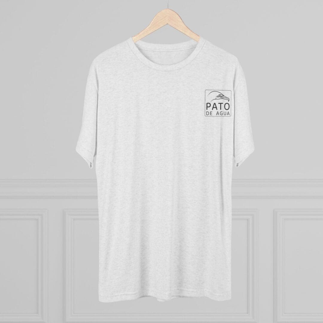 White oversized t-shirt with a small printed design on the chest pocket area.