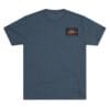 Navy blue T-shirt with a small rectangular logo on the chest.