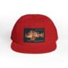 Red cap with a black patch featuring a detailed motorcycle graphic.