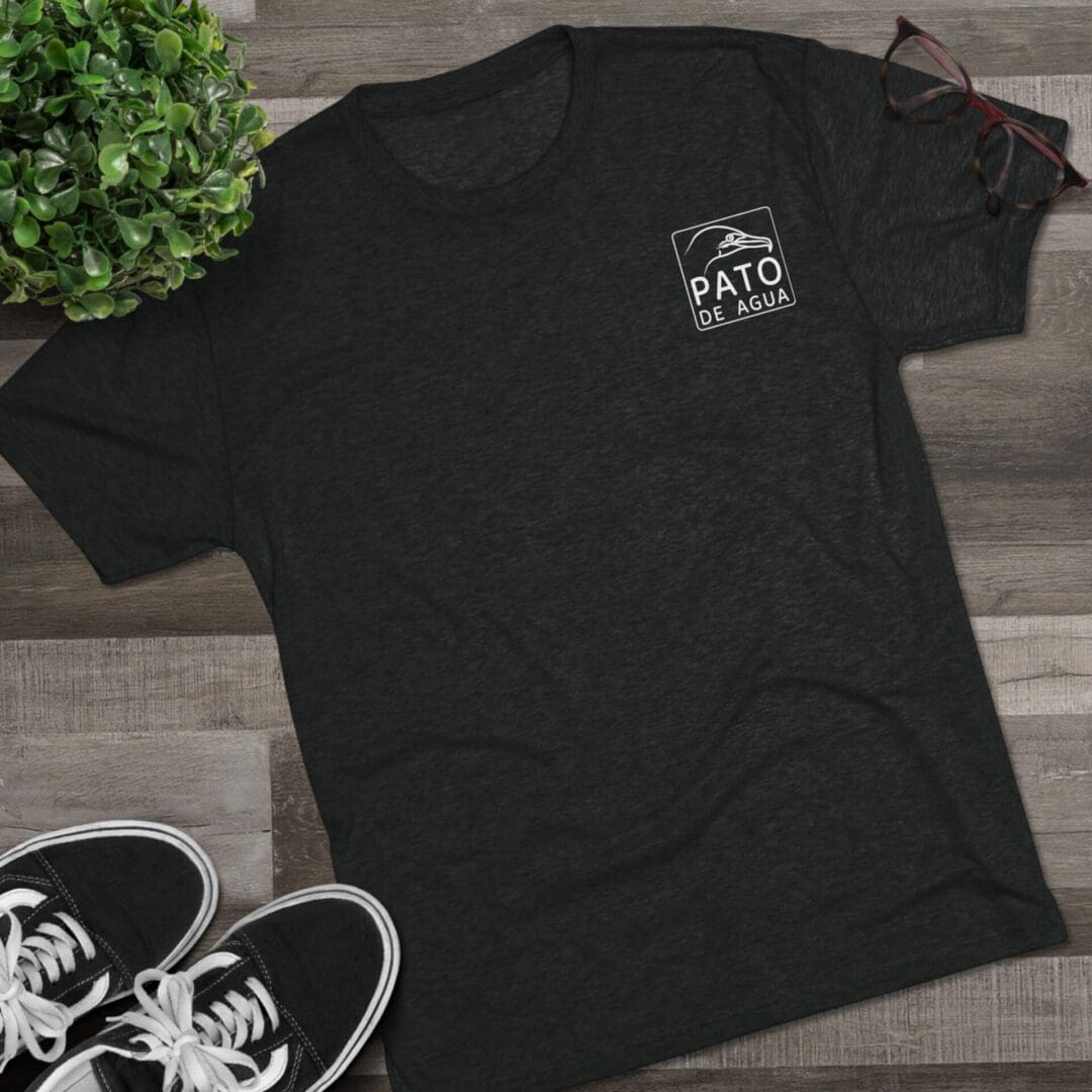 Black T-shirt with a small white logo on the chest.