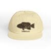 Beige cap with a black fish graphic and 'CABRILLA' text.