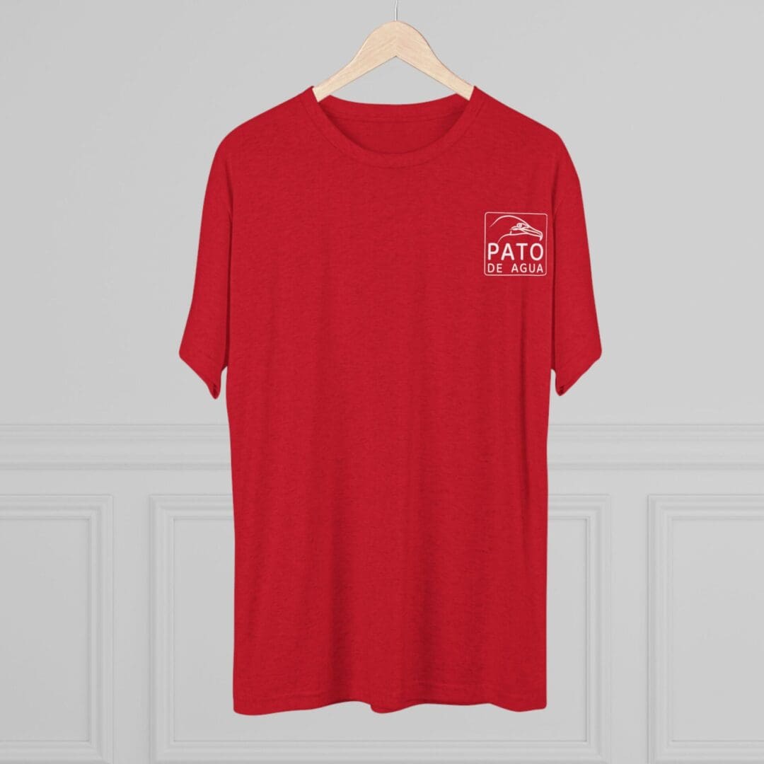 Red T-shirt with a small white text design on the chest.