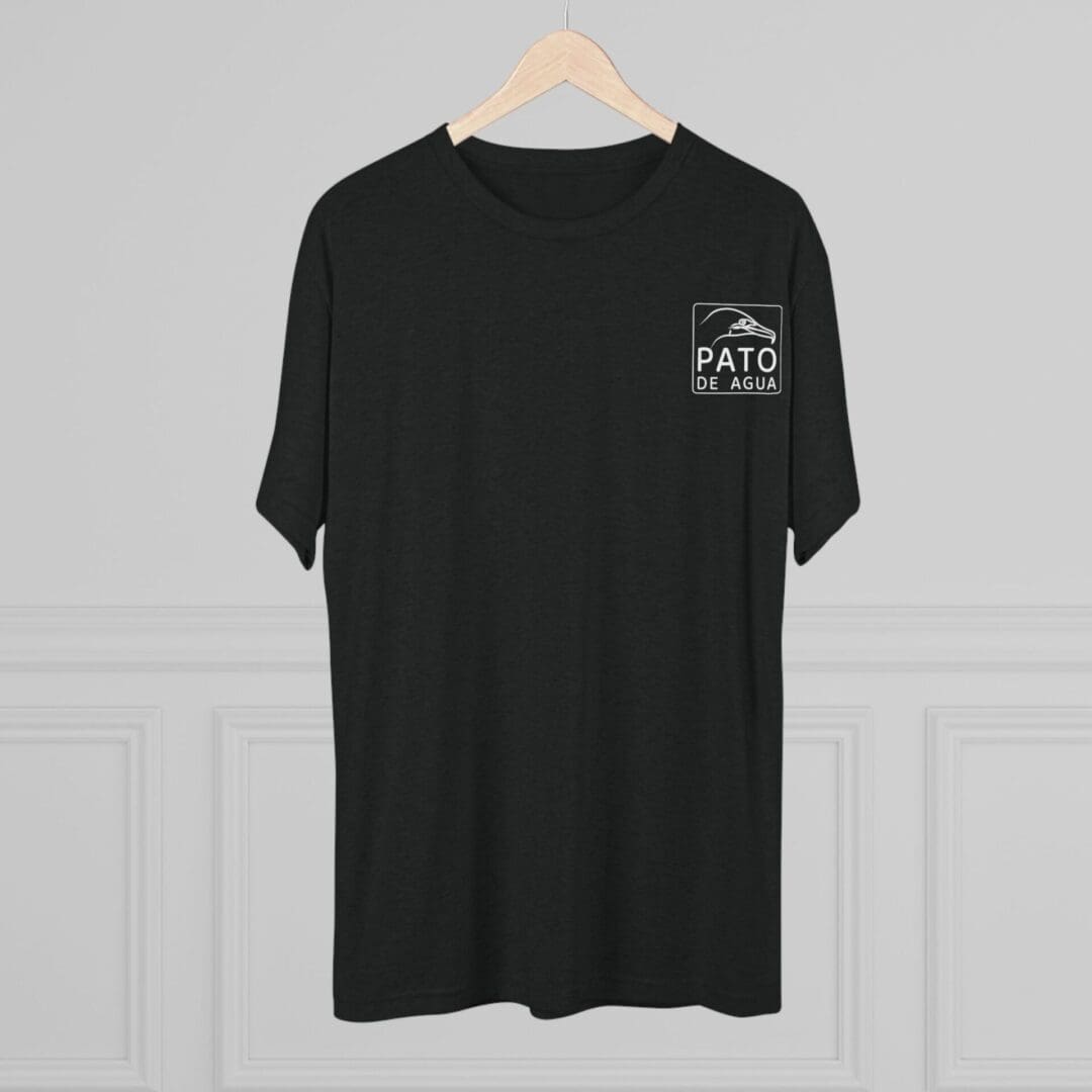 Black t-shirt with white text on the chest hanging on a wooden hanger.