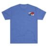 Blue T-shirt with a small colorful graphic on the chest pocket area.