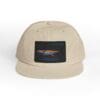 Beige cap with a black rectangular patch featuring a colorful bird design.
