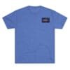Blue crewneck T-shirt with a small rectangular patch on the chest.
