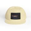 Beige cap with a black rectangular patch featuring a bird graphic.
