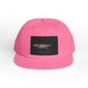 Pink snapback hat with a black patch featuring a bird design.