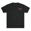 Black t-shirt with a small red graphic on the chest.