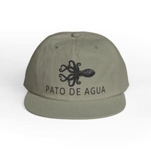 Olive green cap with 'PATO DE AGUA' and intricate black logo.