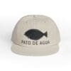 Beige cap with a black fish and 'PATO DE AGUA' text.