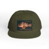 Green baseball cap with a vintage-style graphic patch on front.