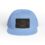 Light blue baseball cap with a dark patch featuring a fish design.